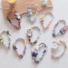 2026 Cute and playful hand-woven mobile phone lanyard, penguin rabbit animal lanyard, pendant, anti-loss wrist strap for girls Application Scenario